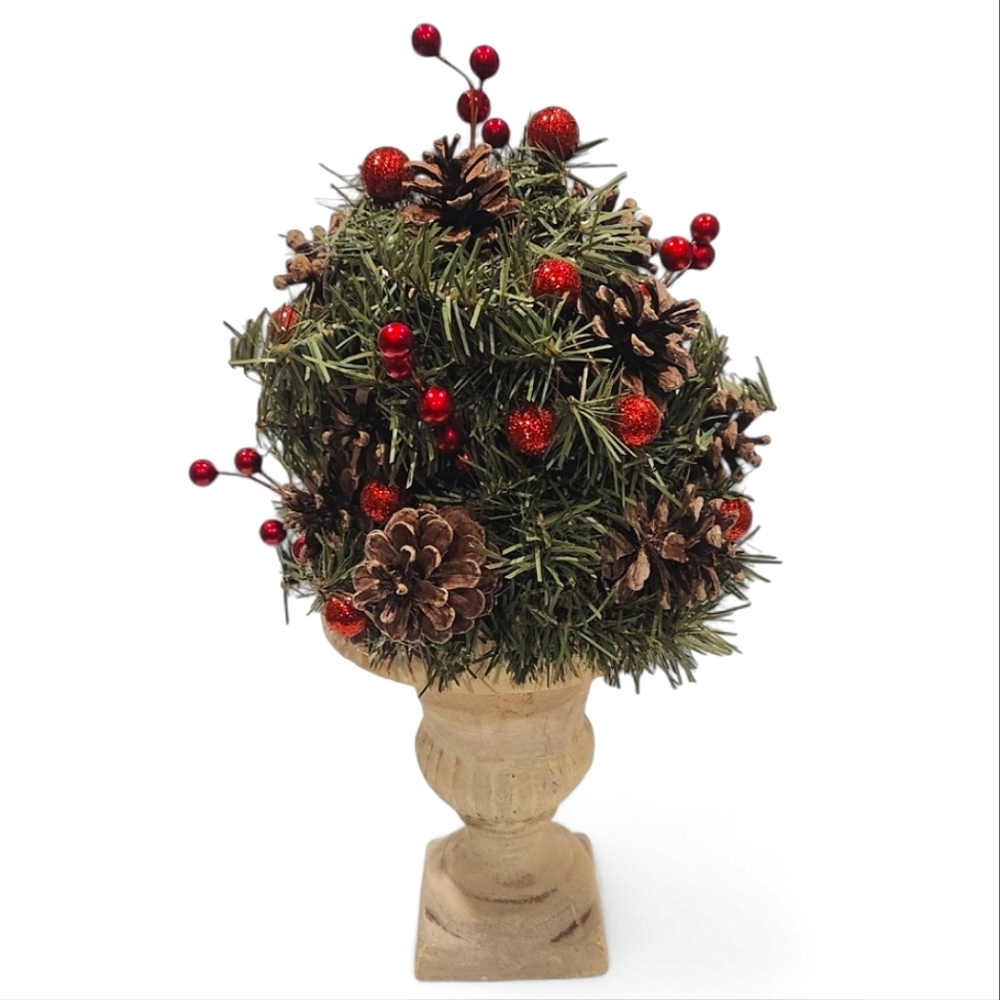 Holiday Greenery with Red Berries and Pinecones in an Urn